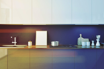 Gray kitchen countertop with a small poster toned