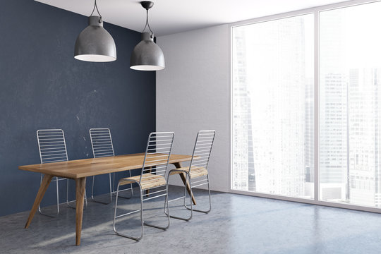 Blue dining room corner, wooden table