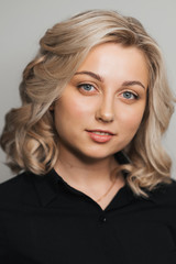 Fototapeta premium Portrait of young Caucasian blonde girl with Nude makeup with clean skin