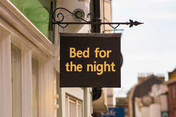bed for the night sign