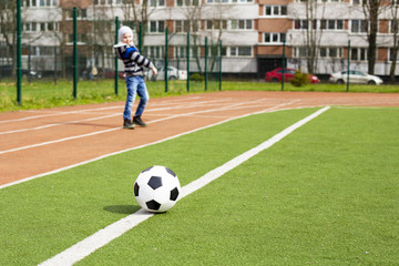 Boy playing ball