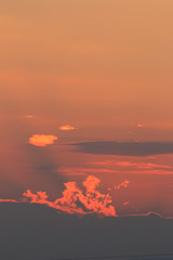 Oragne Clouds reflect sunlight In evening