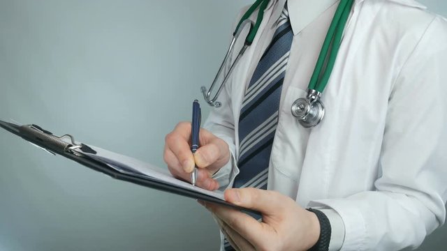 doctor works with records