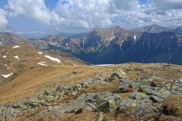 Mountain landscape High Tatras National Park, Žiarska dolina, Slovakia, Europe. Tourists walk in the mountains. Active holiday concept