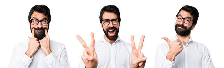 Fototapeta premium Handsome man with glasses making victory gesture