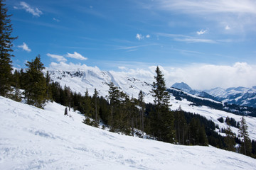 Fototapeta na wymiar Panoramic view of Alps from mountain above Kitzbuhel, Austria