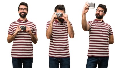 Set of Man with glasses holding a camera