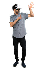 Handsome man using VR glasses