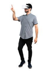 Handsome man using VR glasses