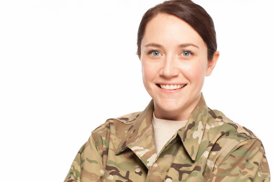 Smiling female army soldier.
