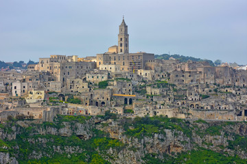 Fototapeta na wymiar Italy, Basilicata, Matera, city of stones, Unesco heritage, capital of European culture 2019. Panorama from the Belvedere. (photo with post-production) 