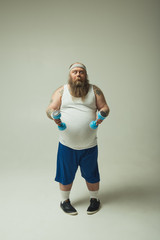 Man exercising with dumbbells