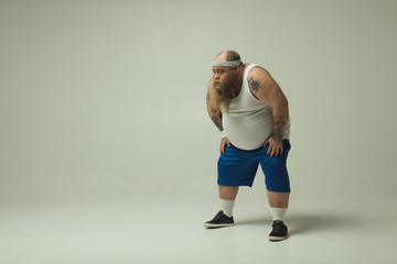 Man catching his breath after exercising