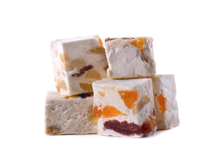 Nut nougat with dried fruit, sweet candy isolated on white background