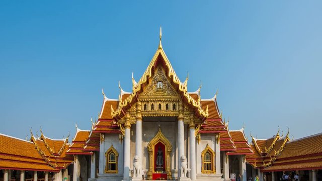 crowed people at benchamabophit or mable temple, a famous tourist attraction in Bangkok Thailand