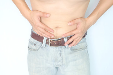 Fototapeta premium Men use abdominal hand. Have unhappy abdominal pain.