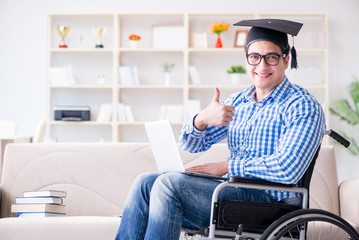 Young student on wheelchair in disability concept