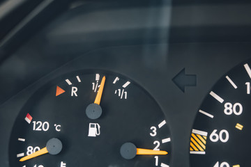 The instrument panel of the car. Red arrow. Close up