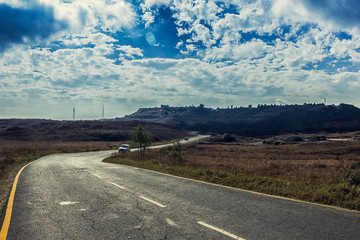 Fototapeta premium Beautiful clouds in the Sky on the road to Cherrapunji, Meghalaya, India