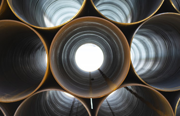 plumbing iron pipes, industry, manufacture of iron pipes - obrazy, fototapety, plakaty
