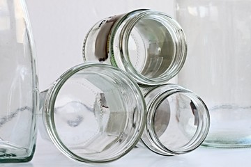 empty glass bottle jars ready for disposal