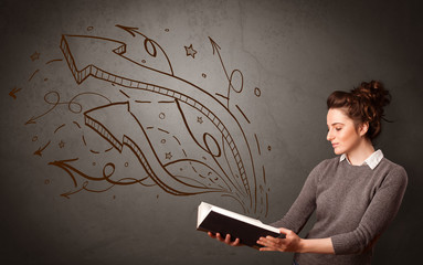 Casual young woman holding book with brown arrows and stars flying out of it