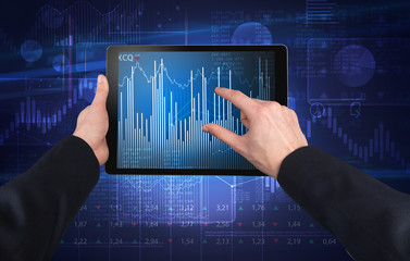 First person hand using tablet and checking financial report on cloud computing system
