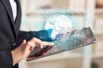 Working business woman with global reports and stock market change concept
