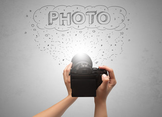 Naked hand photo shooting with message cloud concept and doodles

