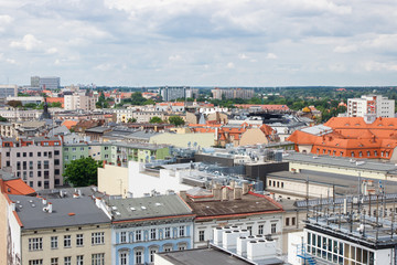 Fototapeta na wymiar Poznan, Poland - June 28, 2016: View on old and modern buildings in polish town Poznan