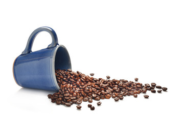 Coffee beans in coffee cup isolated on white