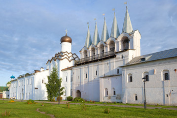 Fototapeta na wymiar Belfry of the Tikhvin Assumption Monastery on a cloudy September morning. Tikhvin, Russia