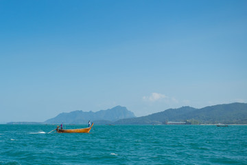 A long tail boat in the sea in Krabi Thailand