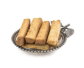 Indian Bakery Food Tea Time Sweet Dry Toast Snack Also Know As Indian Toast Snack, Toasted, Bread, Long Toast, Mawa Toast isolated on White Background