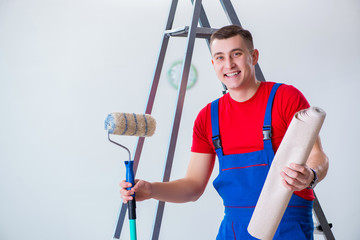 Contractor worker preparing for wallpaper decoration