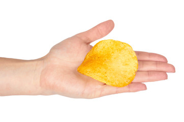 Golden potato chip with hand, isolated on white background