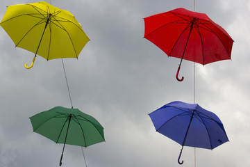 Obraz na płótnie Canvas Ornamental colored umbrellas hanging