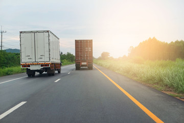 container trucks Logistic by Cargo truck on the road .
