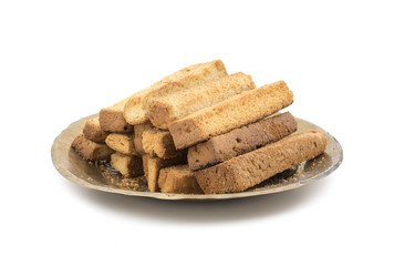Indian Bakery Food Tea Time Sweet Dry Toast Snack Also Know As Indian Toast Snack, Toasted, Bread, Long Toast, Mawa Toast isolated on White Background