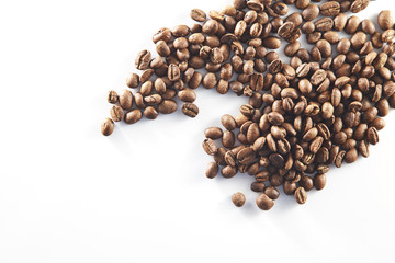 Roasted coffee beans on the table..