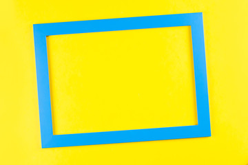 blue color frame on bright yellow background.