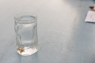Glass of frozen water
