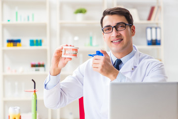 Young dentist working in the dentistry hospital