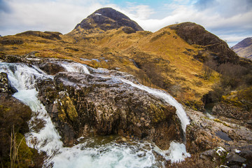 Fototapeta na wymiar Glencoe Waterfall Poster - a scene from the magnificent Scottish Glen