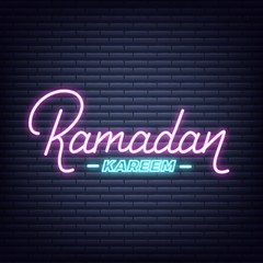 Obraz premium Ramadan Kareem neon design. Illuminated lettering signboard for Ramadan