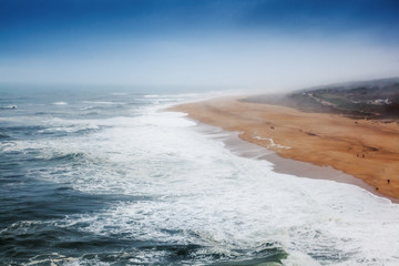 Coast of the Atlantic Ocean in a storm, Portugal, neighborhood Nazare. Beautiful sea ocean landscape