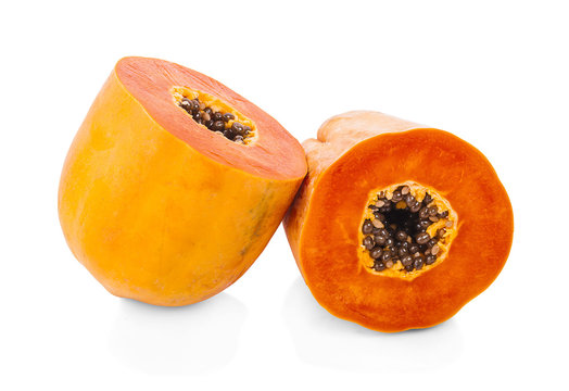 Papaya isolated on white background.Ripe papaya isolated.Yellow papaya isolated.Fresh papaya isolated.Papaya with seeds isolated