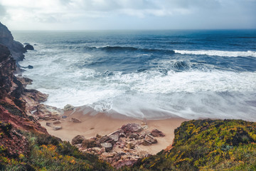 Fototapeta na wymiar Coast of the Atlantic Ocean in a storm, Portugal, neighborhood Nazare. Beautiful sea ocean landscape
