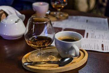Coffee with cognac, on the table.
