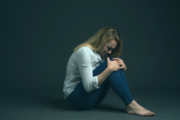 Violence against a woman in the family. The beaten up girl